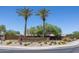 G Diamond Ranch community entrance with palm trees and landscaping at 1340 E Kingman Pl, Casa Grande, AZ 85122