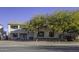 Two-story house with a three-car garage and mature landscaping at 1340 E Kingman Pl, Casa Grande, AZ 85122