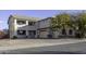 Two-story house with a three-car garage and a gravel driveway at 1340 E Kingman Pl, Casa Grande, AZ 85122