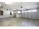 Two-car garage with overhead storage and built-in cabinets at 1340 E Kingman Pl, Casa Grande, AZ 85122