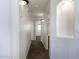 Bright hallway with neutral walls and carpet at 1340 E Kingman Pl, Casa Grande, AZ 85122