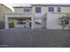 Two-story house with covered patio and large backyard at 1340 E Kingman Pl, Casa Grande, AZ 85122