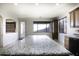 Spacious kitchen featuring granite countertops and modern cabinetry at 1340 E Kingman Pl, Casa Grande, AZ 85122
