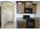 Kitchen with gas range and microwave, granite countertops at 1340 E Kingman Pl, Casa Grande, AZ 85122