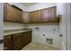 Laundry room with cabinets and countertop at 1340 E Kingman Pl, Casa Grande, AZ 85122