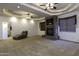 Living room with a stone fireplace and high ceilings at 1340 E Kingman Pl, Casa Grande, AZ 85122