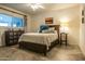 Cozy bedroom with a double bed and plenty of natural light at 1440 E Secretariat Dr, Tempe, AZ 85284