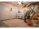 Bedroom with a crib, rocking chair, and fun safari-themed wall mural at 1440 E Secretariat Dr, Tempe, AZ 85284