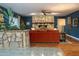 Living room with a stone fireplace and hardwood floors at 1440 E Secretariat Dr, Tempe, AZ 85284
