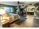 Main bedroom boasts a leafy wall mural and en-suite bathroom at 1440 E Secretariat Dr, Tempe, AZ 85284