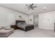 Serene main bedroom with king-size bed and ensuite bathroom access at 18373 W Sells Dr, Goodyear, AZ 85395