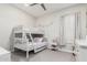 Bedroom with a bunk bed and plenty of natural light at 18373 W Sells Dr, Goodyear, AZ 85395