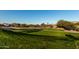 Community green space with walking paths at 18373 W Sells Dr, Goodyear, AZ 85395