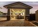 Covered outdoor bar and lounge area, perfect for parties at 18373 W Sells Dr, Goodyear, AZ 85395