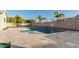 Relaxing backyard with a refreshing pool and expansive patio at 18373 W Sells Dr, Goodyear, AZ 85395