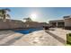 Stunning backyard with a refreshing pool and expansive patio at 18373 W Sells Dr, Goodyear, AZ 85395