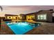 Luxury backyard oasis with a sparkling pool and spa at 18373 W Sells Dr, Goodyear, AZ 85395