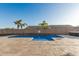 Relaxing backyard with a refreshing pool and expansive patio at 18373 W Sells Dr, Goodyear, AZ 85395