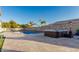 Stunning backyard with a sparkling pool, hot tub, and patio at 18373 W Sells Dr, Goodyear, AZ 85395