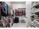 Large walk-in closet with ample shelving and hanging space at 18373 W Sells Dr, Goodyear, AZ 85395