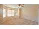 Bright bedroom with bay window, ceiling fan, and carpet flooring at 2394 E Fiesta Dr, Casa Grande, AZ 85194