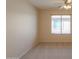 Spacious bedroom with window, ceiling fan and carpet flooring at 2394 E Fiesta Dr, Casa Grande, AZ 85194