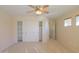 Bedroom with sliding door closet and carpet flooring at 2394 E Fiesta Dr, Casa Grande, AZ 85194