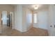 Bright entryway with tile floors and views into the kitchen and living areas at 2394 E Fiesta Dr, Casa Grande, AZ 85194