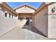Front entryway with walkway and decorative exterior lighting at 2394 E Fiesta Dr, Casa Grande, AZ 85194