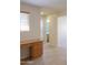 Hallway with built-in desk and bathroom access at 2394 E Fiesta Dr, Casa Grande, AZ 85194