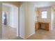 Home office features built-in wood desk and cabinets at 2394 E Fiesta Dr, Casa Grande, AZ 85194