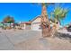 Single story house with two car garage and desert landscaping at 2394 E Fiesta Dr, Casa Grande, AZ 85194