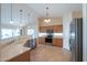 Kitchen with light wood cabinets, stainless steel appliances, and an island at 2394 E Fiesta Dr, Casa Grande, AZ 85194