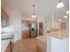 Kitchen with ample counter space, stainless steel appliances, and wood cabinets at 2394 E Fiesta Dr, Casa Grande, AZ 85194
