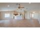 Open concept living room with tile floors and high ceilings at 2394 E Fiesta Dr, Casa Grande, AZ 85194