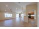 Spacious living room with open floor plan and kitchen access at 2394 E Fiesta Dr, Casa Grande, AZ 85194