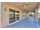 Covered patio with ceiling fan and sliding glass door access at 2394 E Fiesta Dr, Casa Grande, AZ 85194