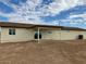 New home with covered patio and large backyard, ready for your personal touch at 25627 W Hedgehog Rd, Wittmann, AZ 85361