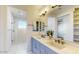 Spa-like bathroom with dual sinks, vanity, and a large mirror at 4444 N 25Th St # 15, Phoenix, AZ 85016