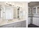 Modern bathroom with dual sinks, ample storage, and gray vanity at 4444 N 25Th St # 15, Phoenix, AZ 85016