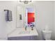 Modern bathroom with gray vanity and white countertop at 4444 N 25Th St # 15, Phoenix, AZ 85016