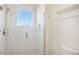 Clean bathroom with a walk-in shower, subway tile, and glass enclosure at 4444 N 25Th St # 15, Phoenix, AZ 85016