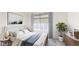 Modern bedroom with large window, stylish decor, and plenty of light at 4444 N 25Th St # 15, Phoenix, AZ 85016