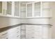 Spacious closet with glass-front cabinets and drawers at 4444 N 25Th St # 15, Phoenix, AZ 85016