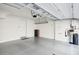 Attached garage with overhead storage and epoxy flooring at 4444 N 25Th St # 15, Phoenix, AZ 85016