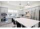 Modern kitchen with gray cabinets, quartz countertops, and stainless steel appliances at 4444 N 25Th St # 15, Phoenix, AZ 85016