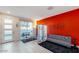 Bright living room with modern furniture and red accent wall at 4444 N 25Th St # 15, Phoenix, AZ 85016