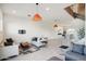 Open concept living room with modern furniture and kitchen view at 4444 N 25Th St # 15, Phoenix, AZ 85016