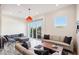 Spacious living room with modern sofas and access to balcony at 4444 N 25Th St # 15, Phoenix, AZ 85016