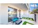 Private patio with artificial turf, seating area, and modern design at 4444 N 25Th St # 15, Phoenix, AZ 85016